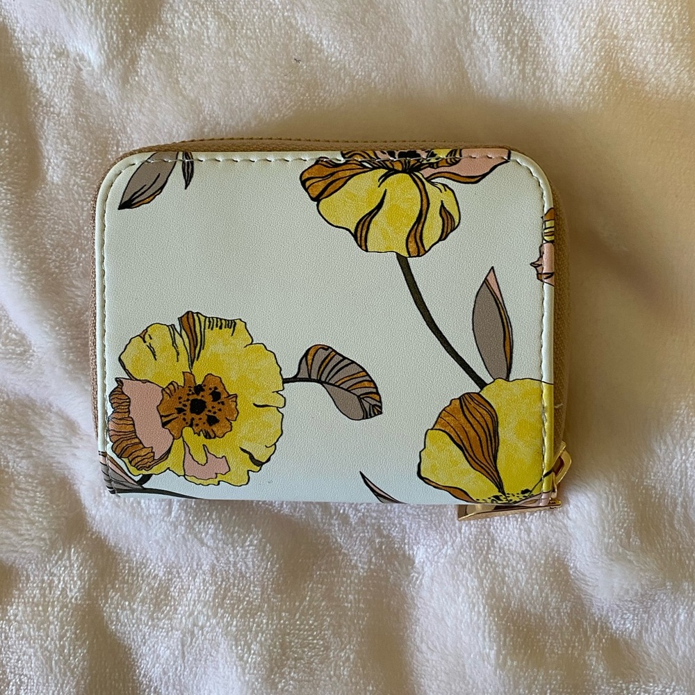 A. new — day Wallet